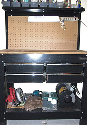 Photograph of inexpensive Kobalt work bench that is "good enough" for PCSing.